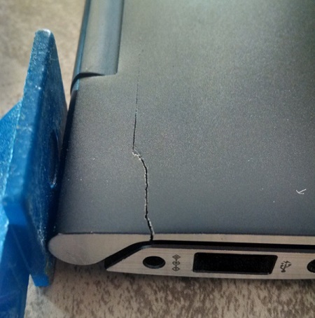 computer with broken plastic