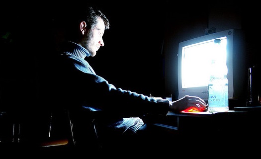 man on computer